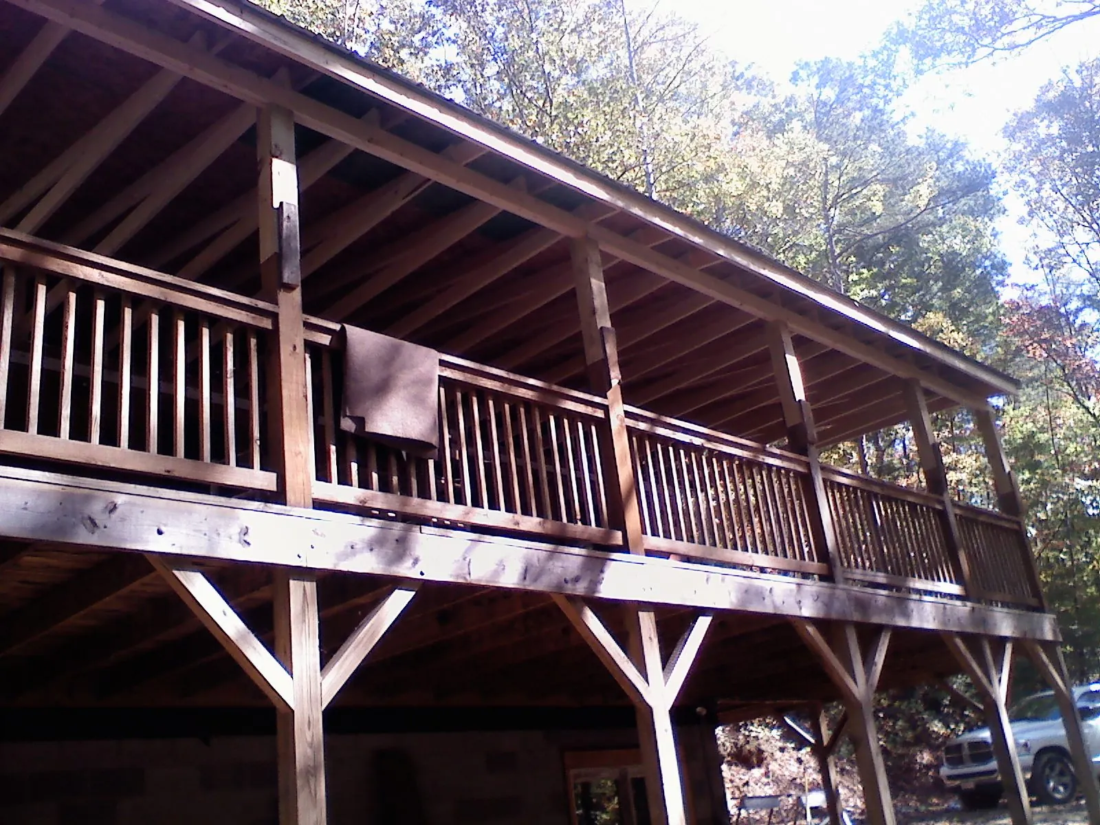 Timber framing under a new elevated porch and deck — Roof Leak Repair in Wells Tannery by Roofing Brothers